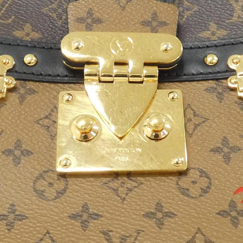 Túi xách đeo vai Louis Vuitton Monogram Reverse Trunk Clutch M43596 - Hàng hiệu Authentic 802690