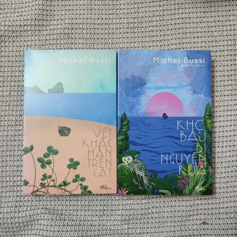 Kho báu bị nguyền rủa - Vết khắc hằn trên cát - Michel Bussi 1023836