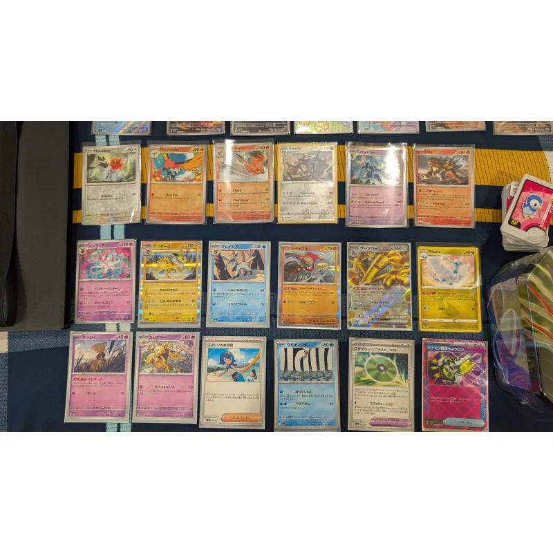 Thẻ bài Pokemon TCG và hộp thiếc như hình 785189