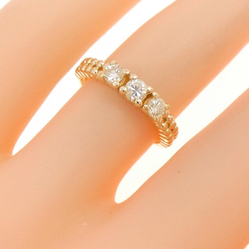 Nhẫn kim cương ba viên K18YG 0.32CT 667685