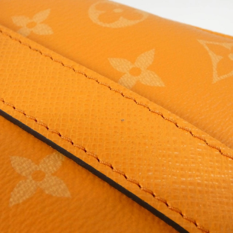 Túi du lịch Louis Vuitton Taiga Rama Keepall Bandoulière 25cm M31044 614610