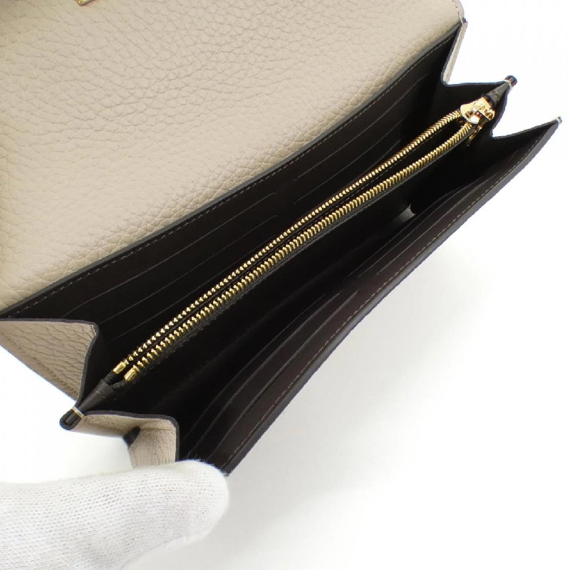 Ví Louis Vuitton Trillon Portefeuille Capucines M61249 623439