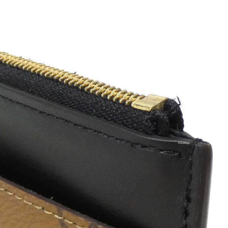 Ví Louis Vuitton Monogram Reverse Slim M80390 622003