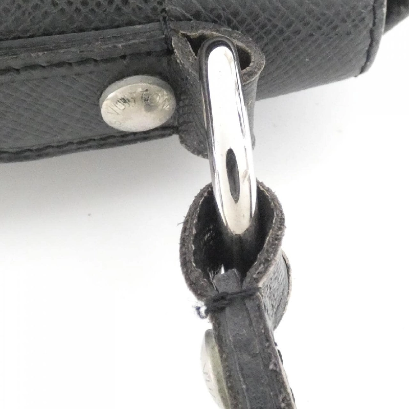 Túi xách vai Louis Vuitton Taiga Andre M32482 609664