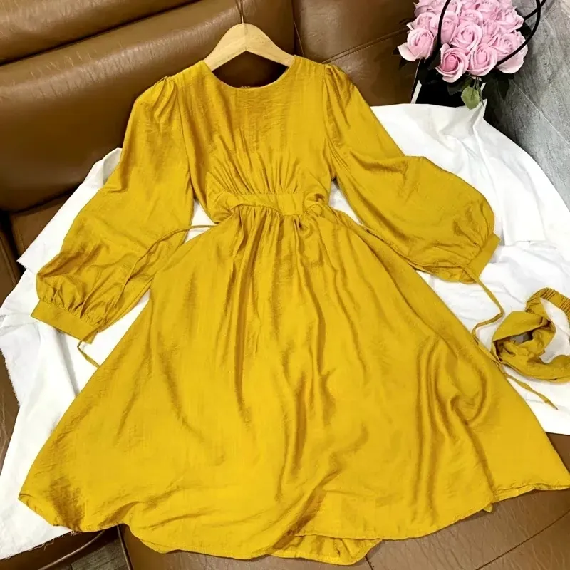 Đầm vàng new 85% 974696