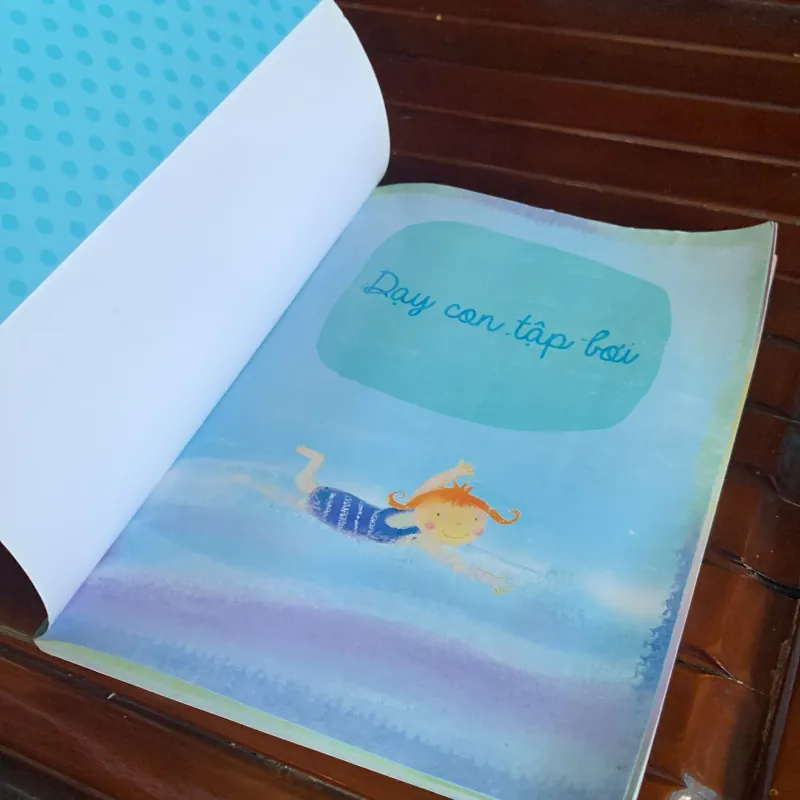Dạy con tập bơi 1047628