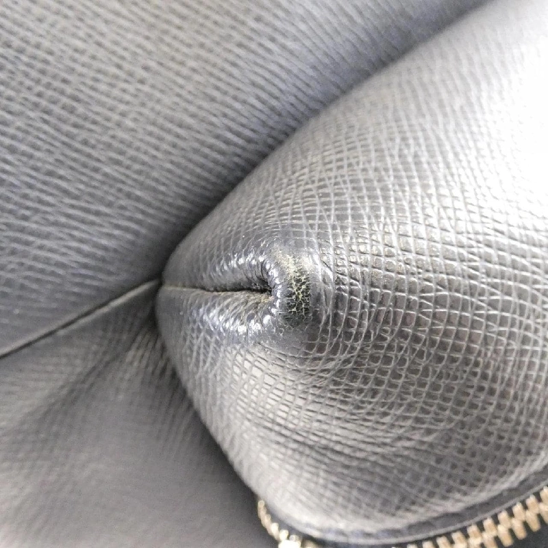 Ba lô Louis Vuitton Taiga Discovery M33451 609545