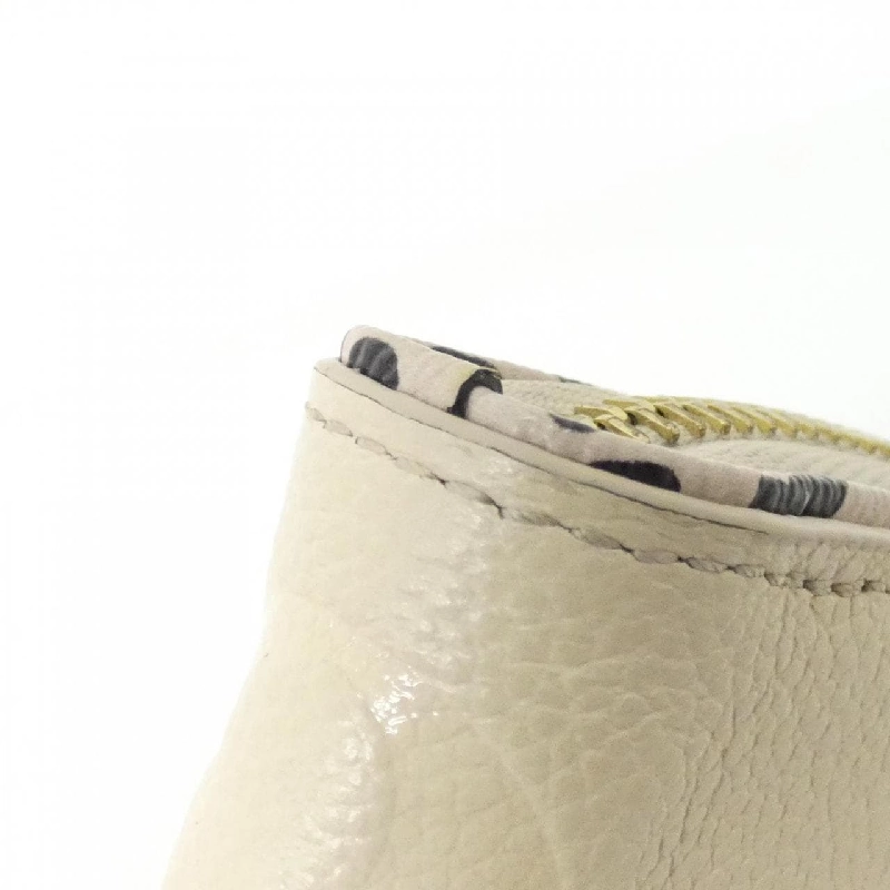 Ví Louis Vuitton Monogram Empreinte (Wild at Zippy Wallet M80685) - Hàng hiệu Chính hãng 805968