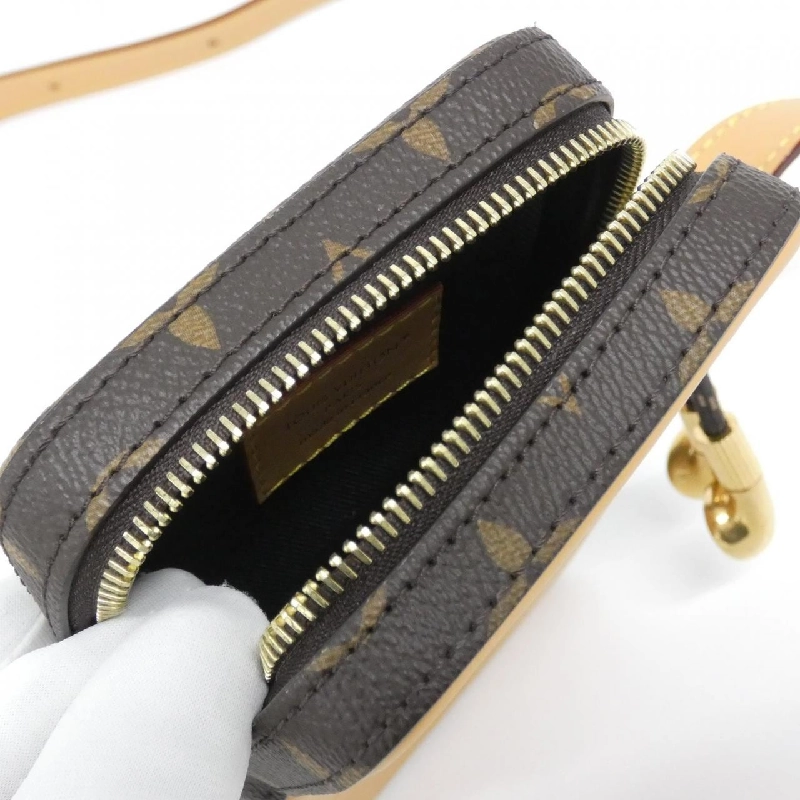 Túi xách mini Louis Vuitton Monogram Music Player Wearable Wallet M14063 - Hàng hiệu Chính hãng 767950