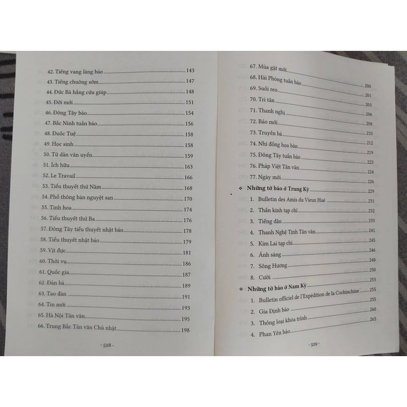 Đằng sau mặt báo 533953