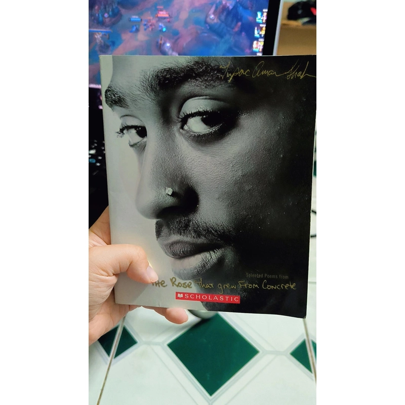 Tupac Shakur
-
The Rose That Grew from Concrete 470296