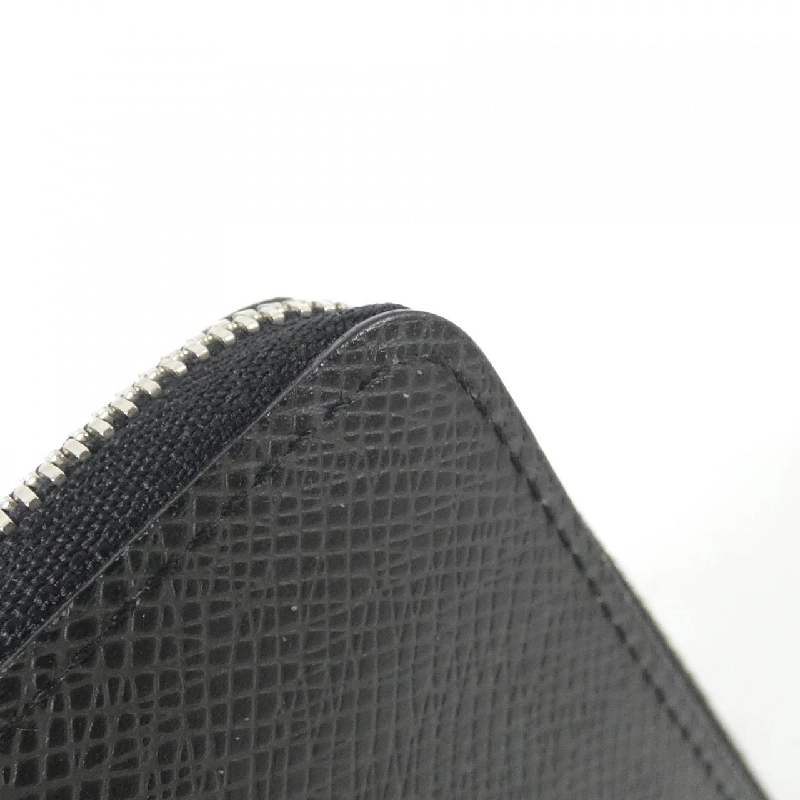 Ví tiền xu Louis Vuitton Taiga Zippy M32832 - Hàng hiệu chính hãng 769114