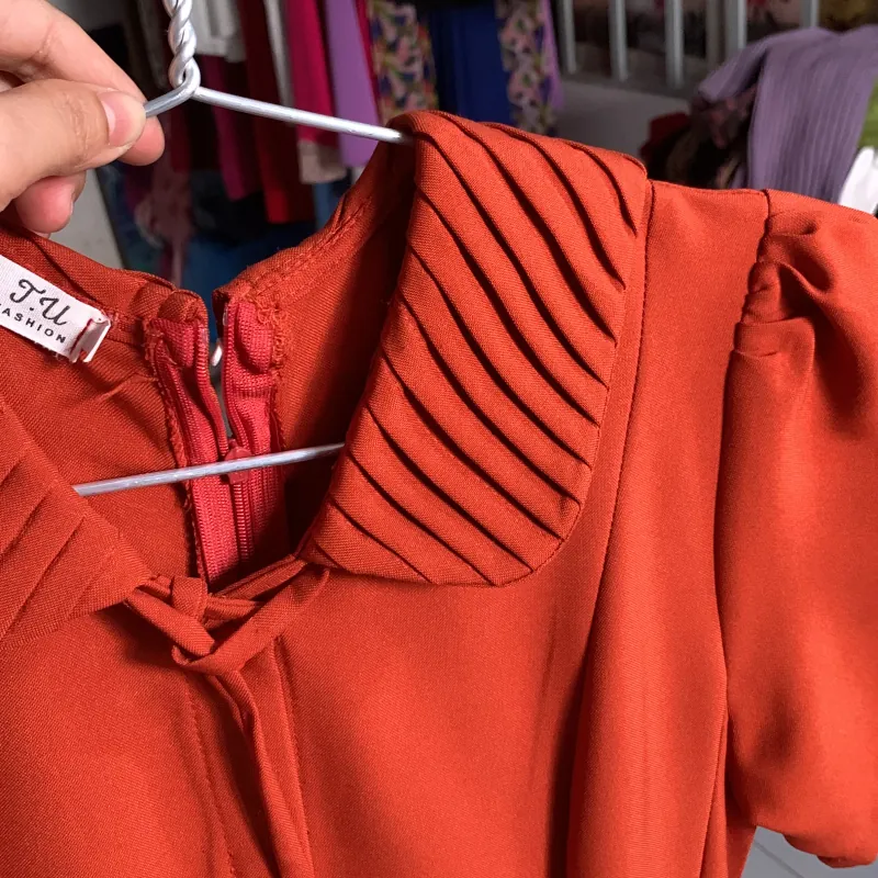 Đầm màu cam đất dài tới cổ chân 927064