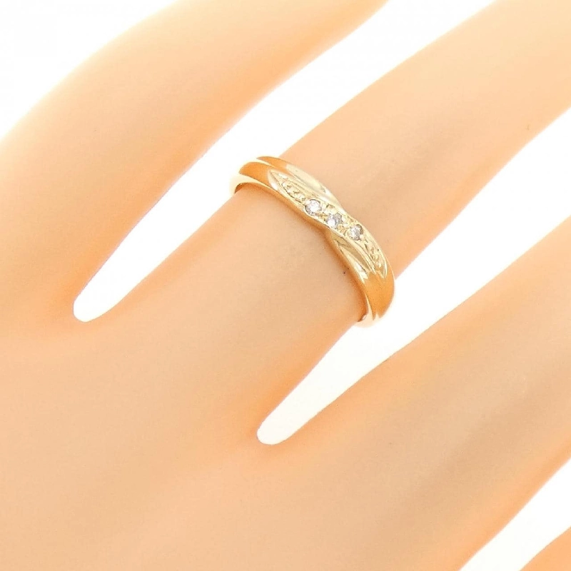 Nhẫn kim cương ba viên K18YG 670195