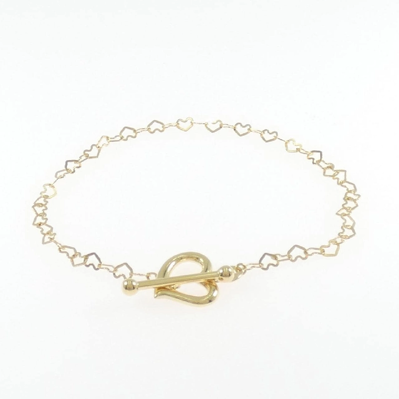 Vòng tay trái tim 750YG của UnoAere 665600