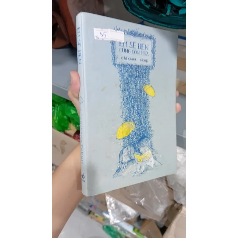 Sách Em sẽ đến cùng cơn mưa 694400