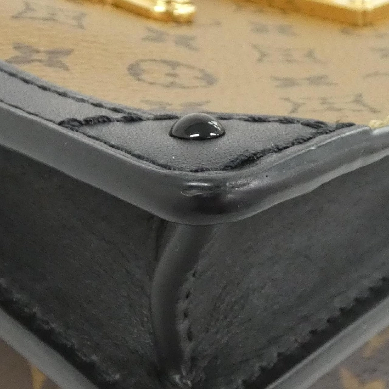 Túi xách đeo vai Louis Vuitton Monogram Reverse Trunk Clutch M43596 - Hàng hiệu Authentic 802690