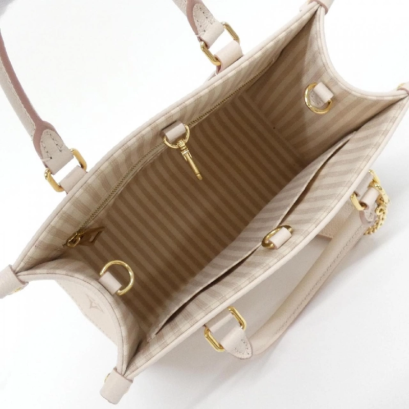 Túi Louis Vuitton Monogram Bicolor OnTheGo PM M14403 615198