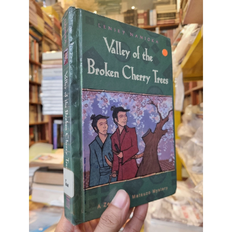 VALLEY OF THE BROKEN CHERRY TREES : A Zenta and Matsuzu Mystery 247047