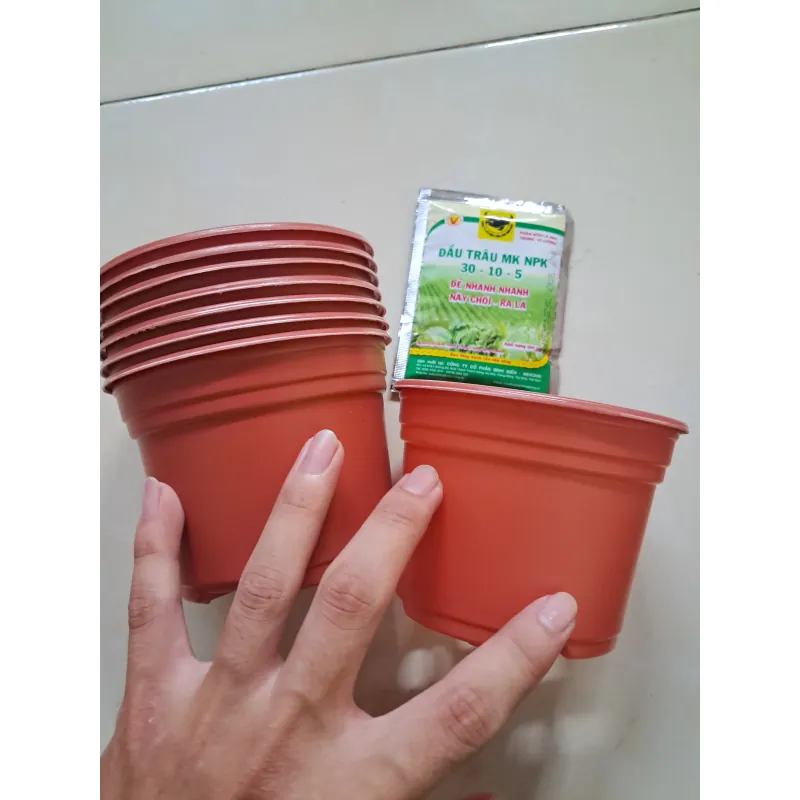 Túi phân bón NPK - chậu nhựa trồng cây 1027564