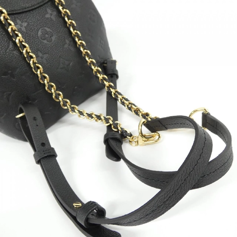 Ba lô Louis Vuitton Monogram Empreinte Backup M47072 609744
