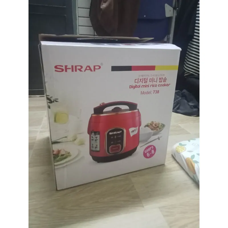 Nồi cơm điện SHRAP màu xanh, thể tích 2,2 lít , tình trạng chưa từng sử dụng 756998