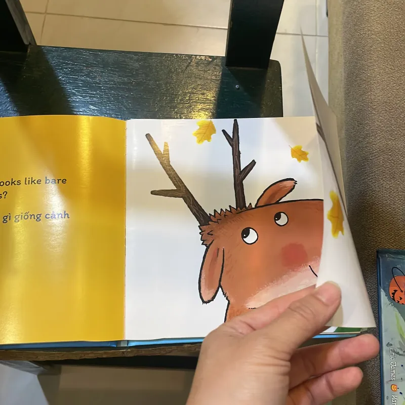 Sách đố vui lật giở song ngữ : Đoán xem là gì ? - Guido Van Genechten  1027410