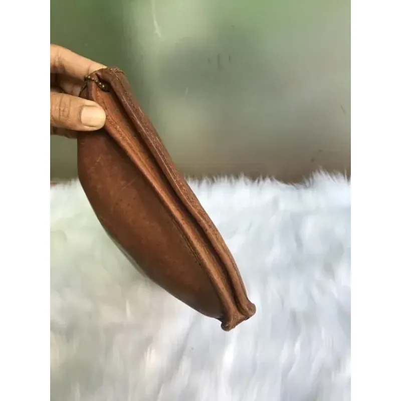 Túi loại cầm tay . COACH USA màu da bò 936341