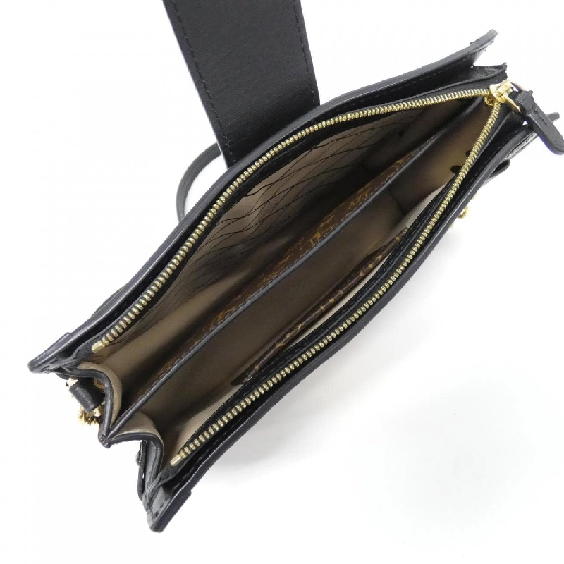 Túi xách vai Louis Vuitton Monogram Reverse Trunk Clutch M43596 610903