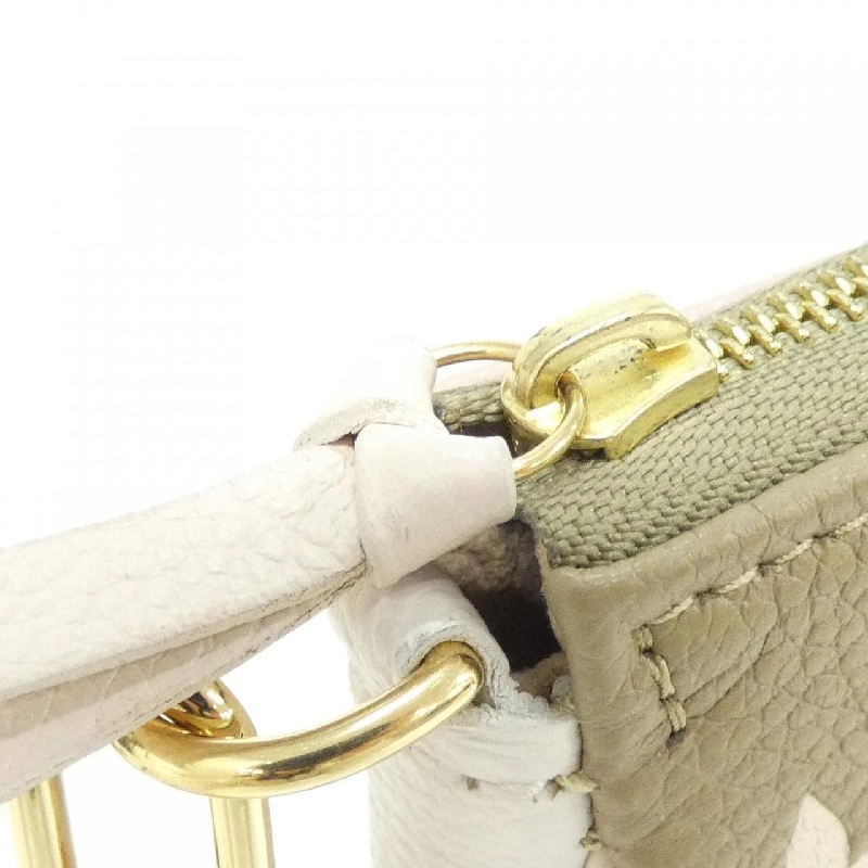 Túi đeo chéo Louis Vuitton Monogram Empreinte (Spring in the City) Mini Pochette Accessoires M81284 - Hàng hiệu Authentic 806163