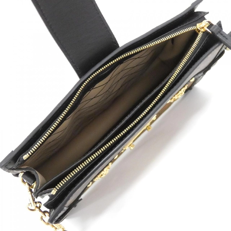 Túi xách đeo vai Louis Vuitton Monogram Reverse Trunk Clutch M43596 612081