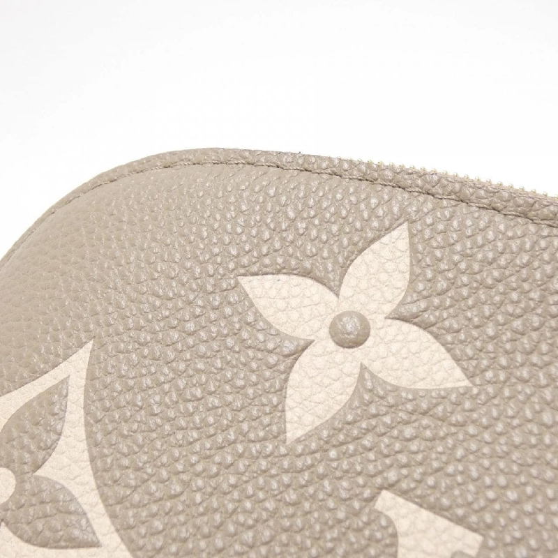 Túi xách Louis Vuitton hai màu Monogram Empreinte Cosmetic PM M45951 623566