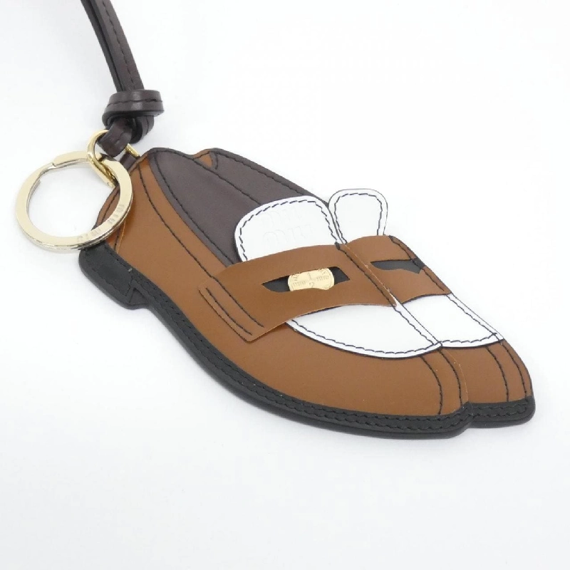 Miu Miu 5TL532 Charm - Hàng hiệu Authentic 624799