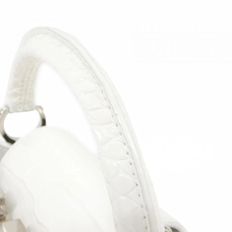 Túi xách Louis Vuitton Exotic Leather Capucines MINI N93701 614238