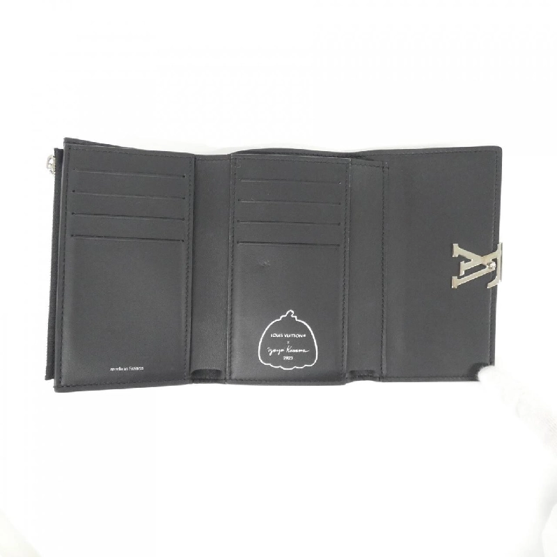 Ví Louis Vuitton Trillon (LV X YK) Portefeuille Capucines Compact M81963 621532