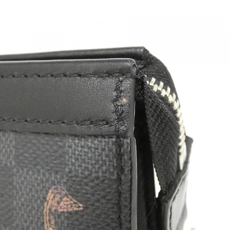 Túi đeo vai Louis Vuitton Damier Graphite Stamp Gaston Wearable Wallet N64608 611532