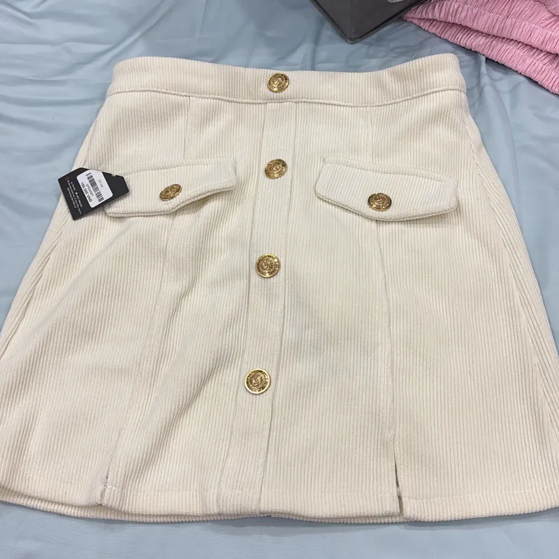 Chân váy có cúc sz M  694737