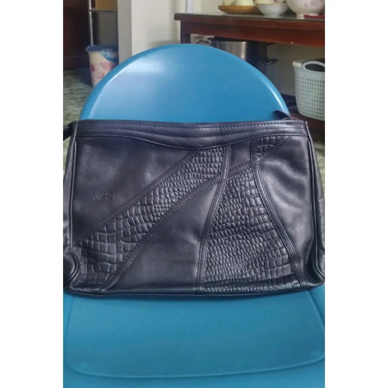 Cluth cầm tay da bò 1034888