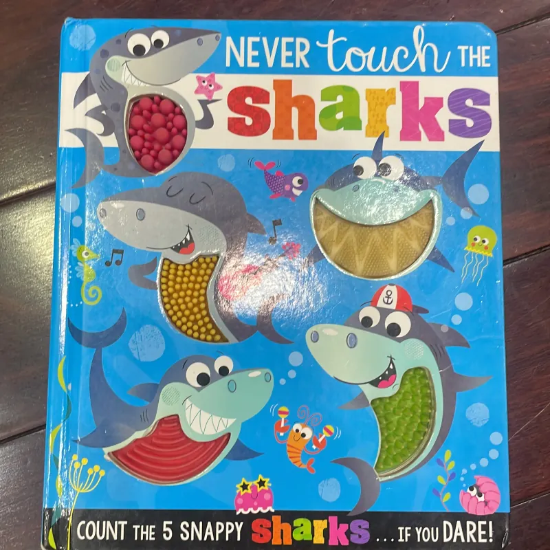 Ngoại văn tiếng anh trẻ em : NEVER TOUCH THE SHARKS - count the 5 snappy sharks  1028018
