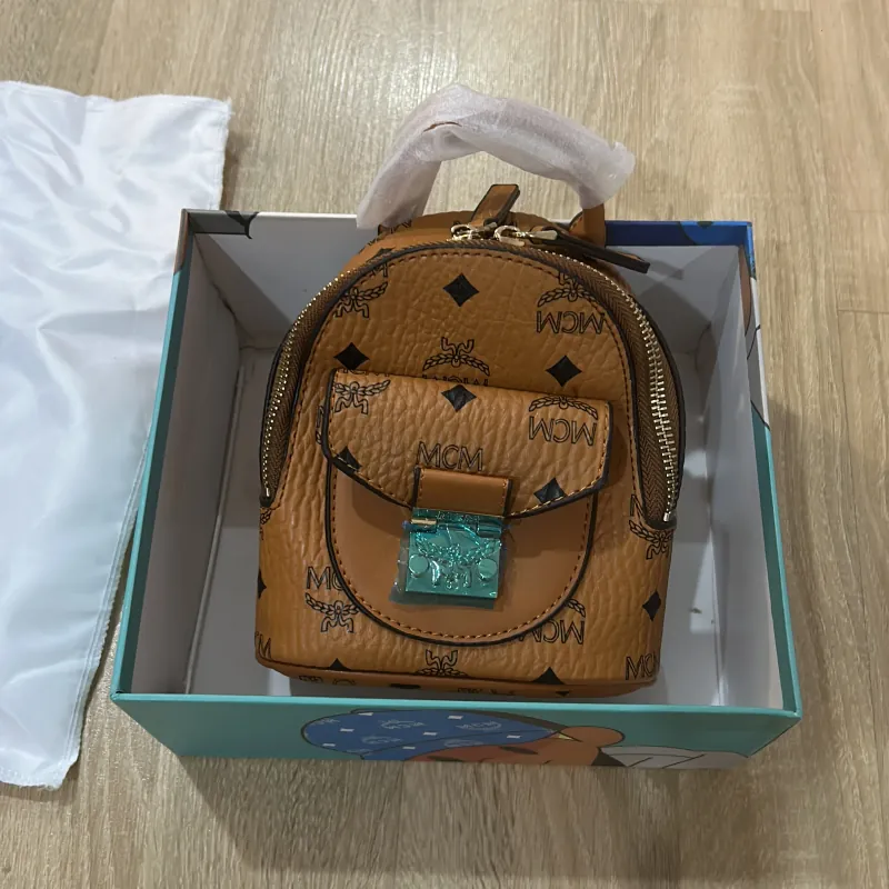 BALO MINI MCM DA MÀU NÂU CHẤT LƯỢNG 1021540