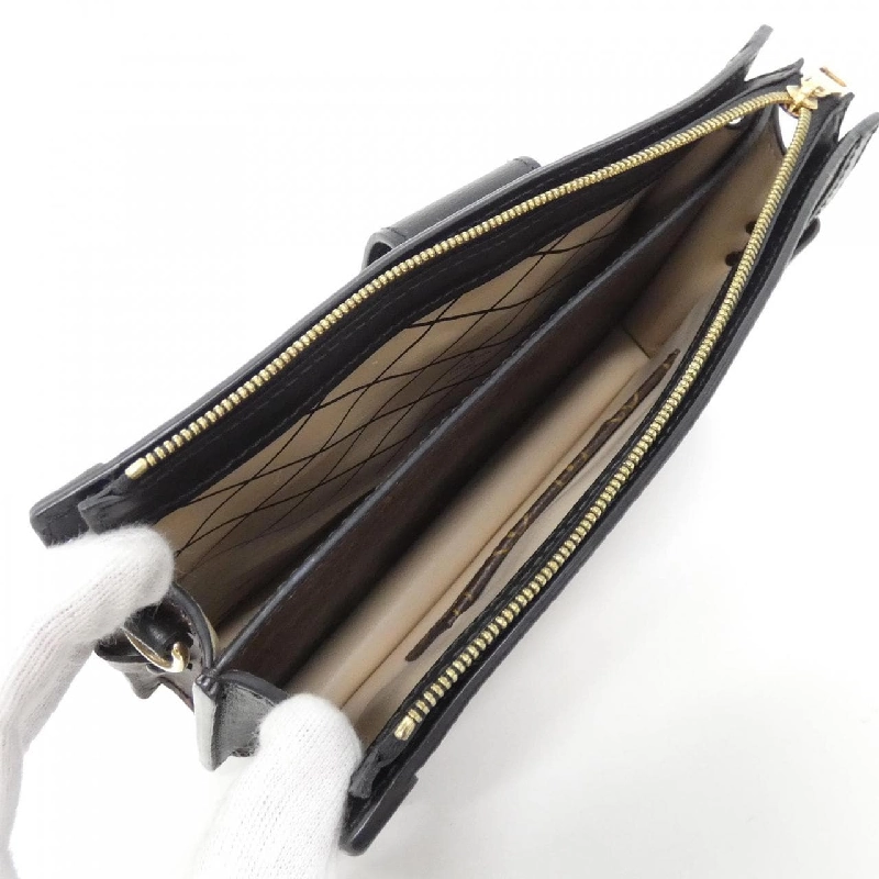 Túi xách đeo vai Louis Vuitton Monogram Reverse Trunk Clutch M43596 - Hàng hiệu Authentic 766815