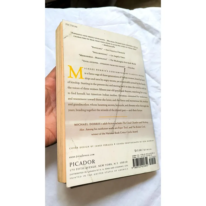 A yellow raft in blue water - Michael Dorris 732638