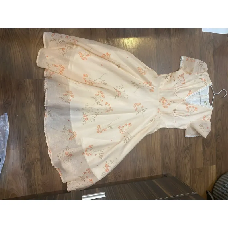 Đầm hoa màu cam nhạt ren tay bánh  bèo size S 574845