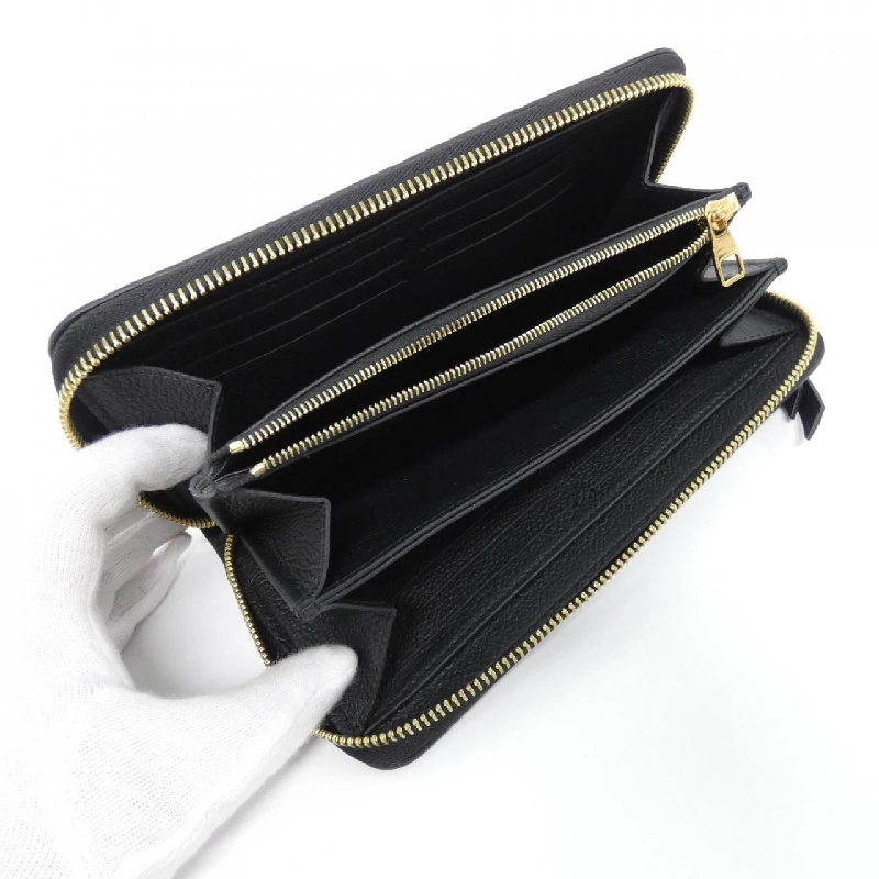 Ví Louis Vuitton Monogram Empreinte Zippy M61864 621487