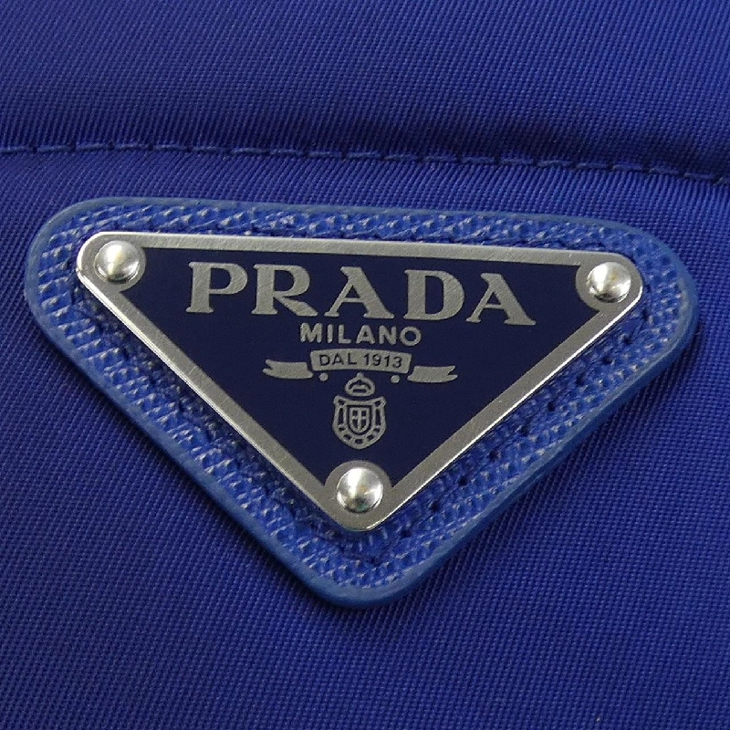 Áo khoác lông vũ PRADA với logo hình tam giác 29X042 S222 1WQ8 - Hàng hiệu Chính hãng 820831