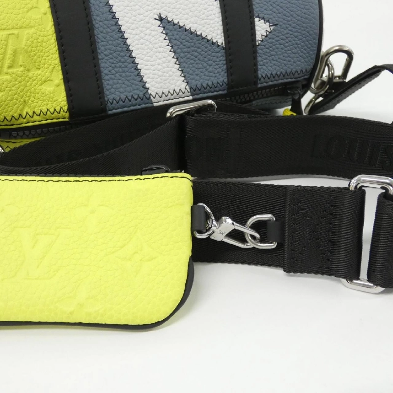 Túi đeo vai Louis Vuitton Day Break Polochon M59927 609512