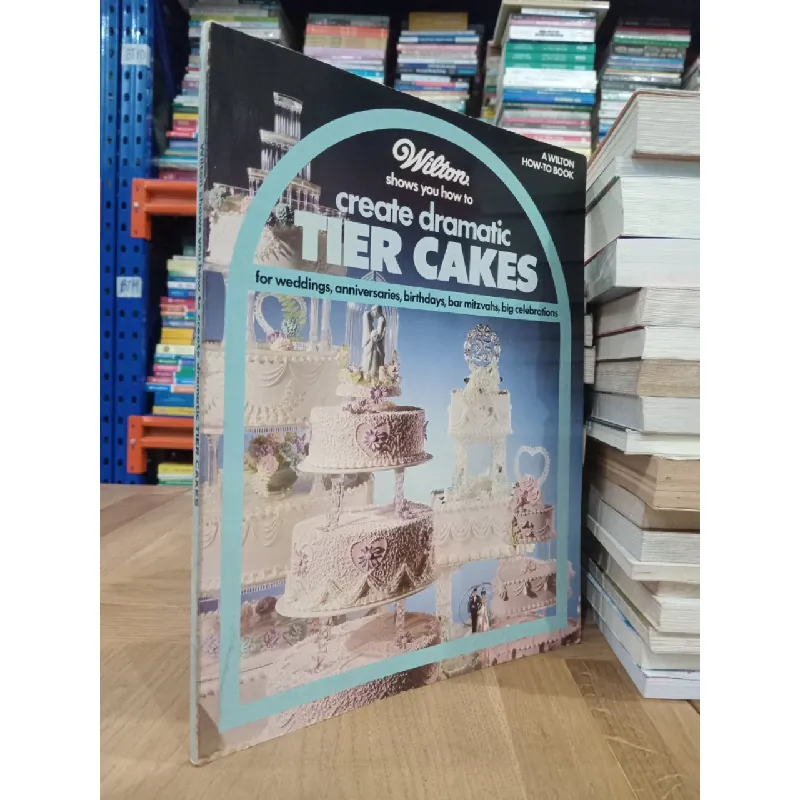 Wilton shows you how to create dramatic tier cakes 589474