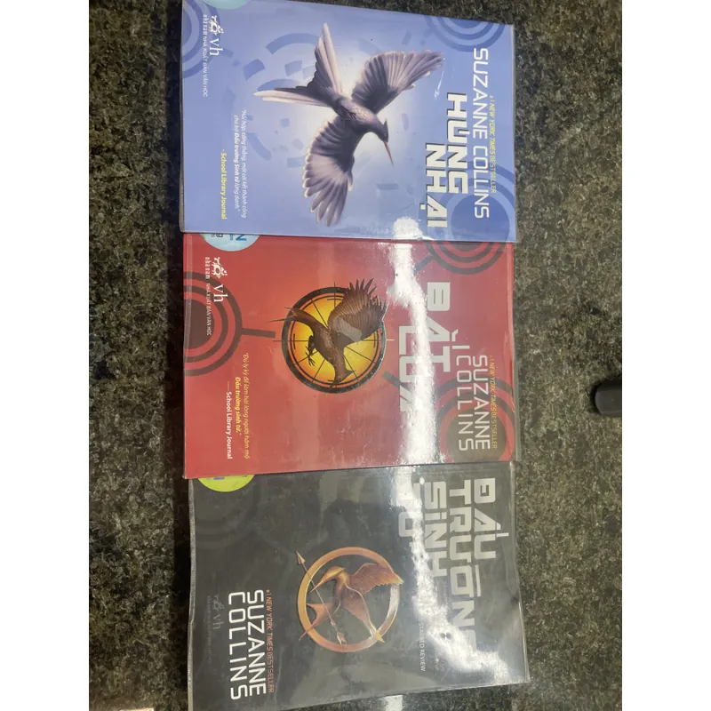 Húng nhại, bắt lửa, đấu trường sinh tử Suzanne Collins 713245