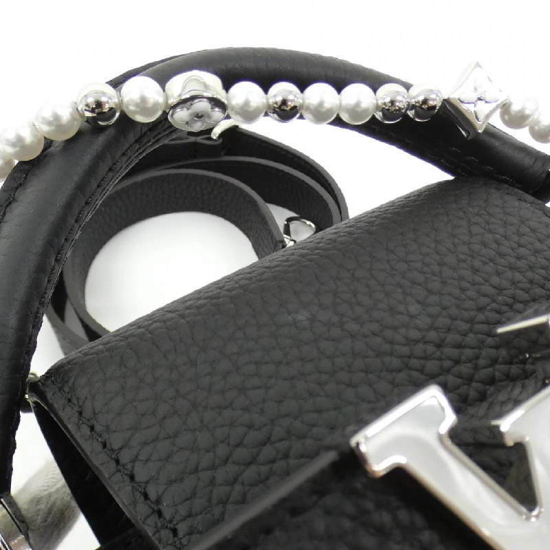 Túi Louis Vuitton Capucines MINI M11908 616530