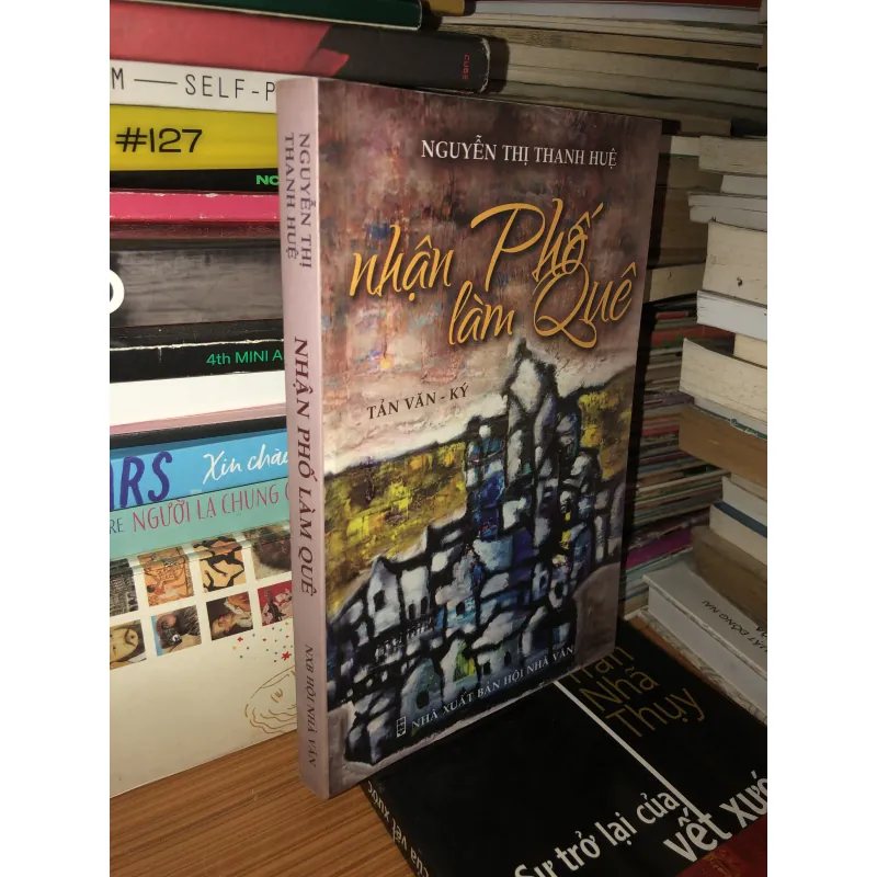 Nhận phố làm quê - Nguyễn Thị Thanh Huệ 1011107